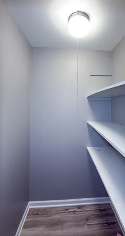 a view of small space with racks on the wall