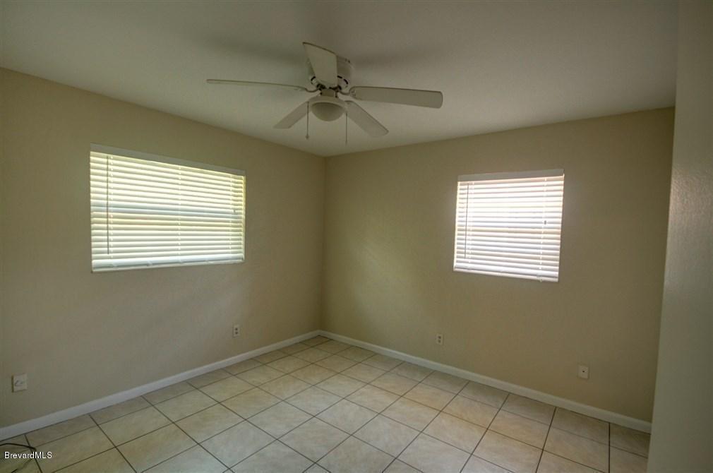 1312 Moss Lane Cocoa, FL 32922 - Photo 11 of 24 a view of an empty room with a window