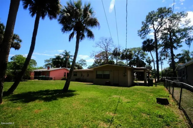 a view of a garden with a bench