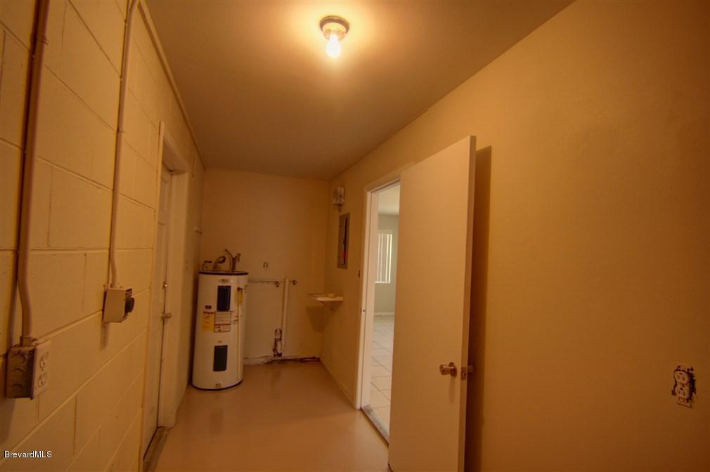 1312 Moss Lane Cocoa, FL 32922 - Photo 6 of 24 a bathroom with a shower