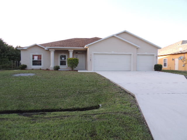 1109 Southwest Kickaboo Road Port St. Lucie, FL 34953 - Photo 1 of 37 Front