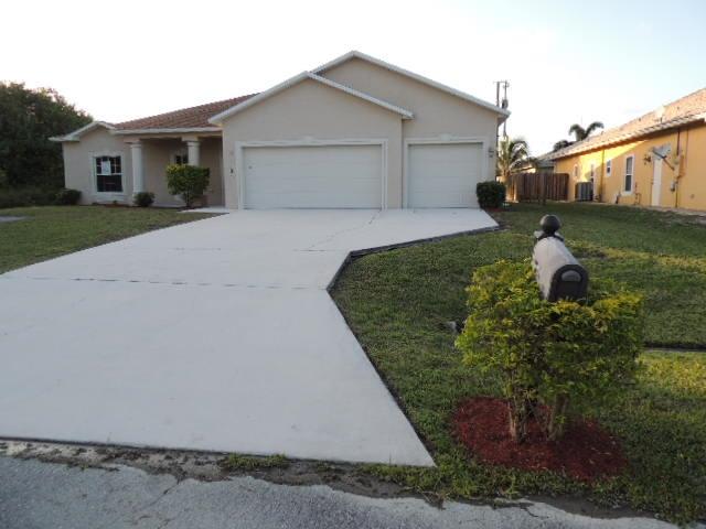 1109 Southwest Kickaboo Road Port St. Lucie, FL 34953 - Photo 22 of 37 FrontSideRight