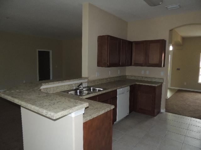 1109 Southwest Kickaboo Road Port St. Lucie, FL 34953 - Photo 24 of 37 Kitchen_