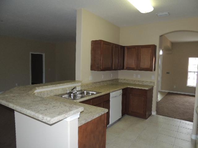 1109 Southwest Kickaboo Road Port St. Lucie, FL 34953 - Photo 25 of 37 Kitchen__