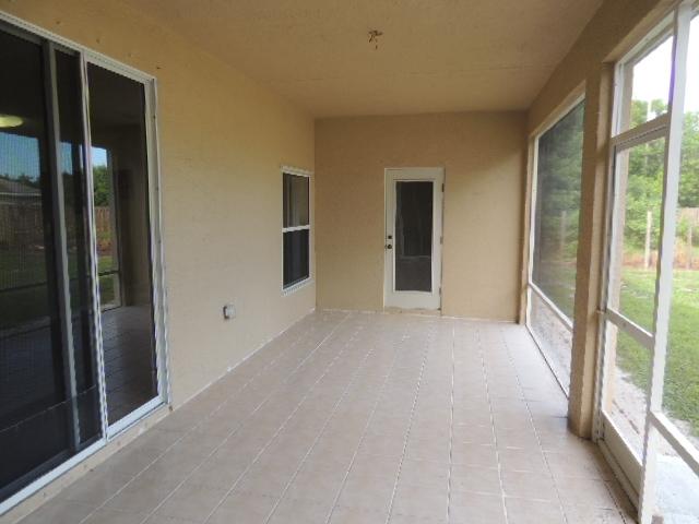 1109 Southwest Kickaboo Road Port St. Lucie, FL 34953 - Photo 35 of 37 Patio