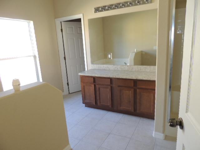 1109 Southwest Kickaboo Road Port St. Lucie, FL 34953 - Photo 9 of 37 BathMaster