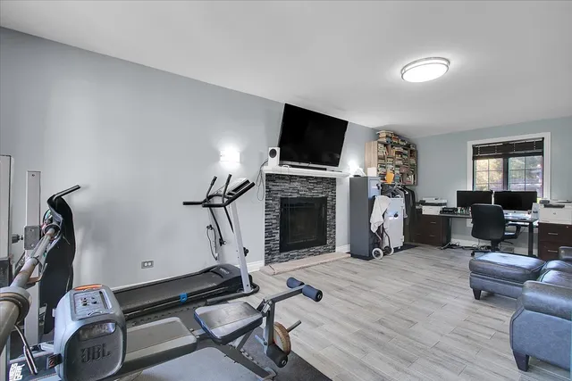 a view of a livingroom with furniture and a flat screen tv