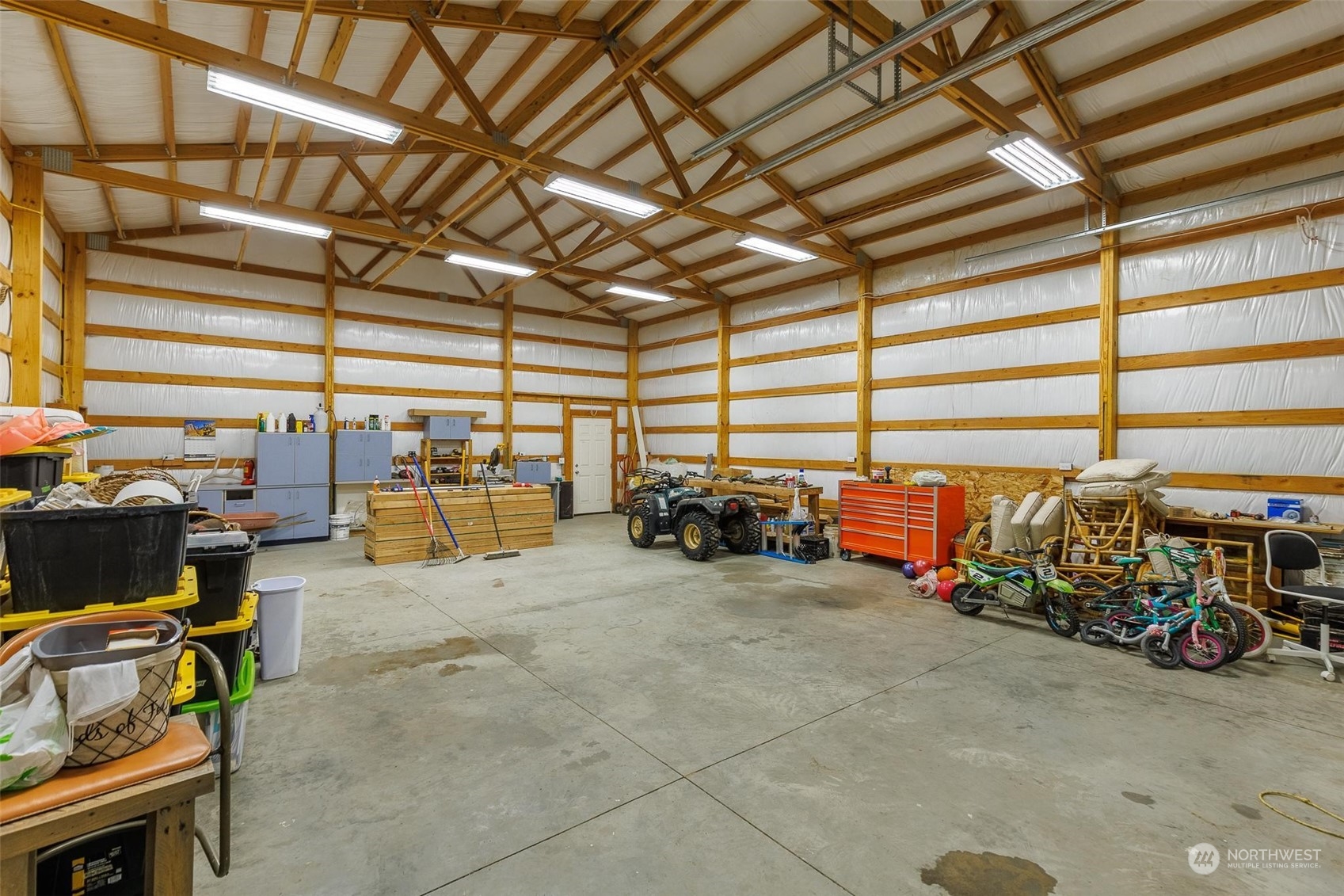 108108 West King Tull Road Prosser, WA 99350 - Photo 23 of 36 a view of a storage room with a lot of stuff