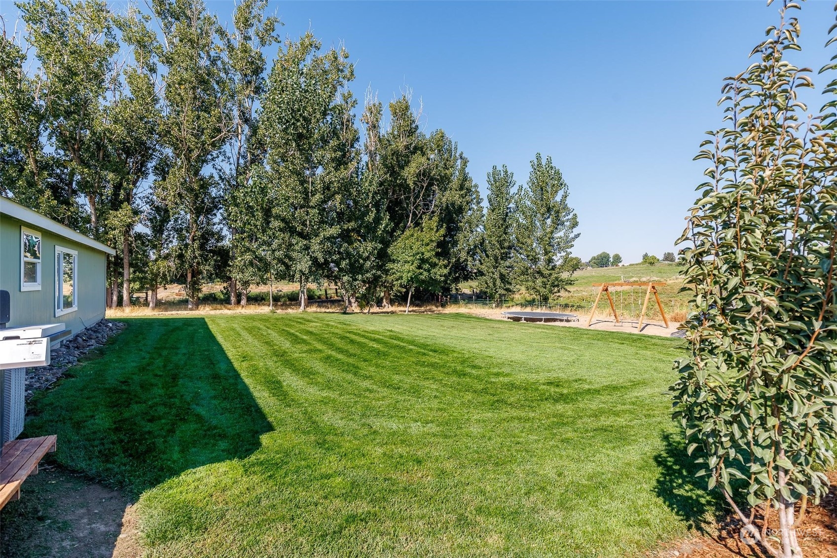 108108 West King Tull Road Prosser, WA 99350 - Photo 27 of 36 a view of a house with a big yard
