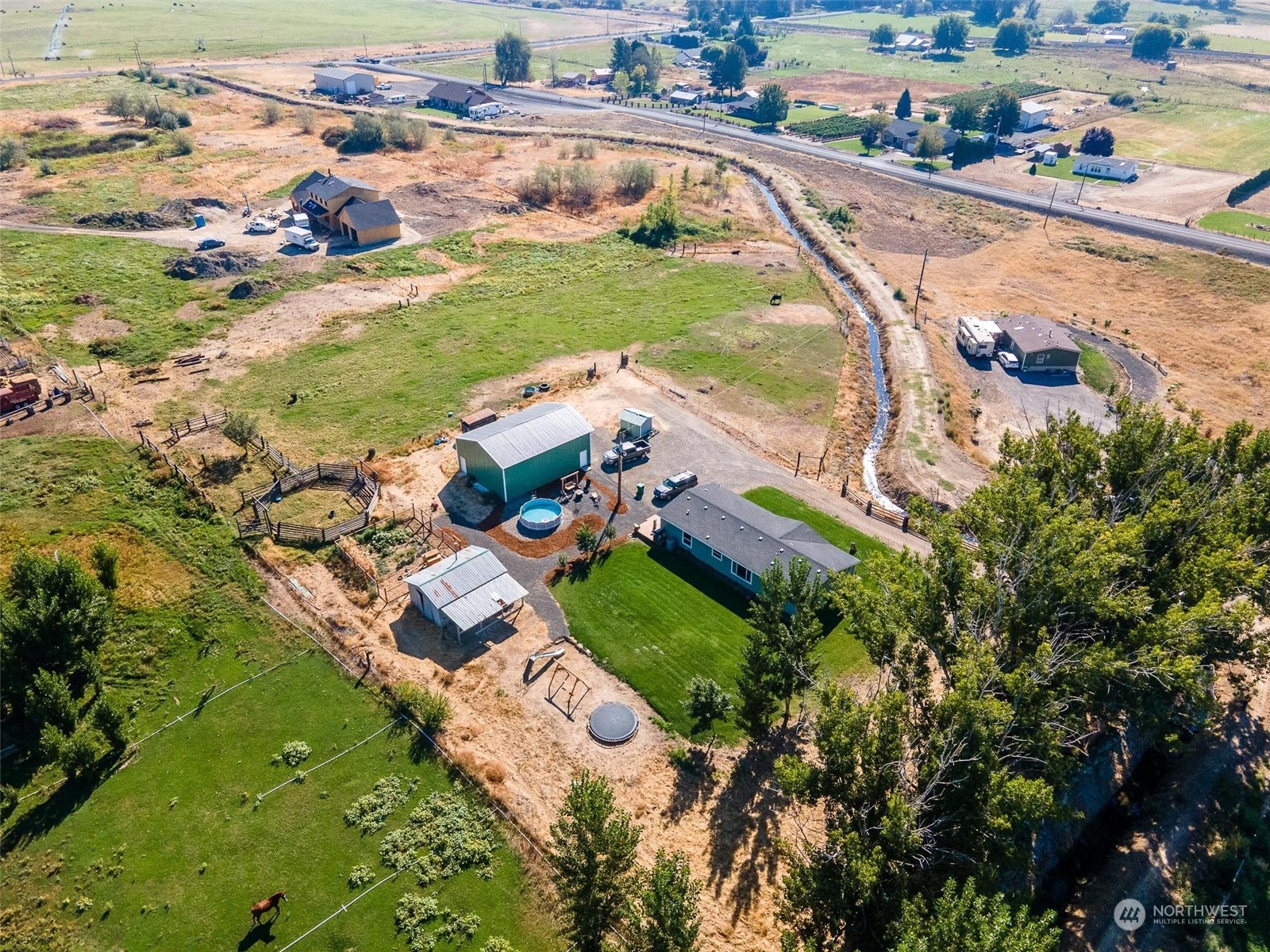 108108 West King Tull Road Prosser, WA 99350 - Photo 33 of 36 an aerial view of residential houses with outdoor space