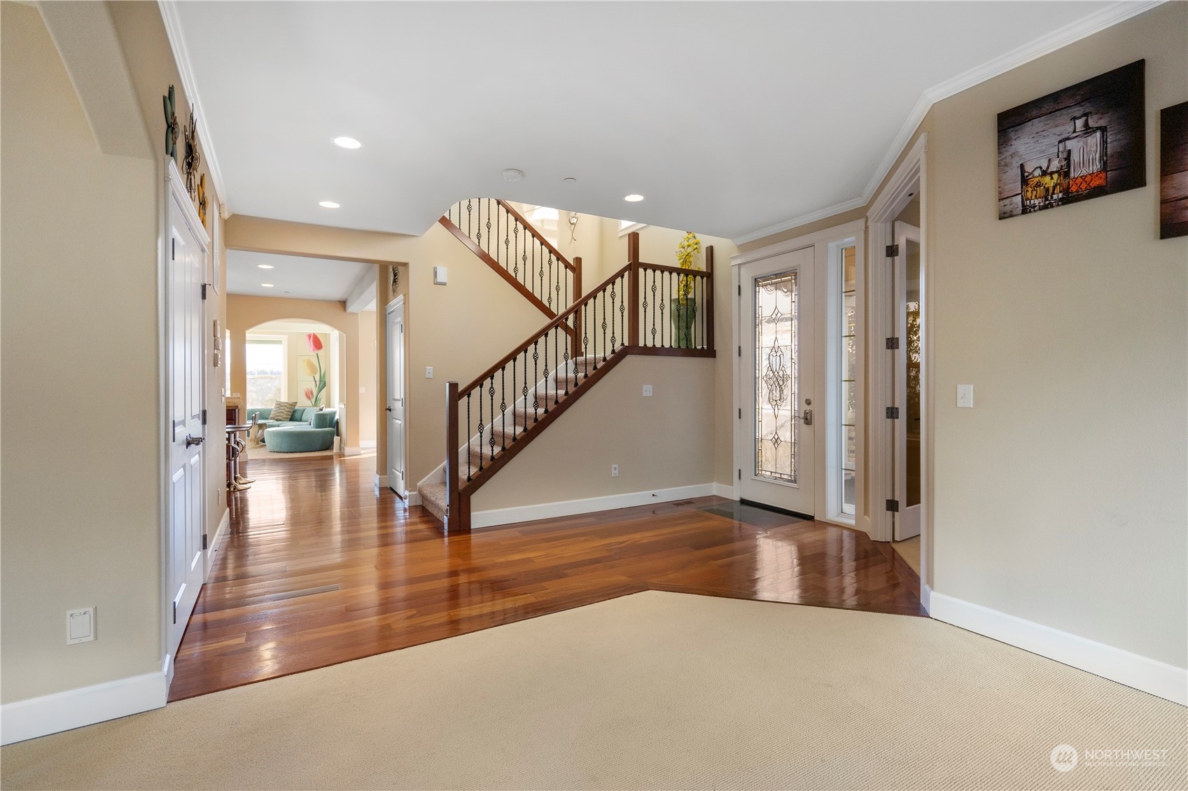 319 Maple Avenue Northwest Renton, WA 98057 - Photo 5 of 10 a view of entryway and hall with wooden floor