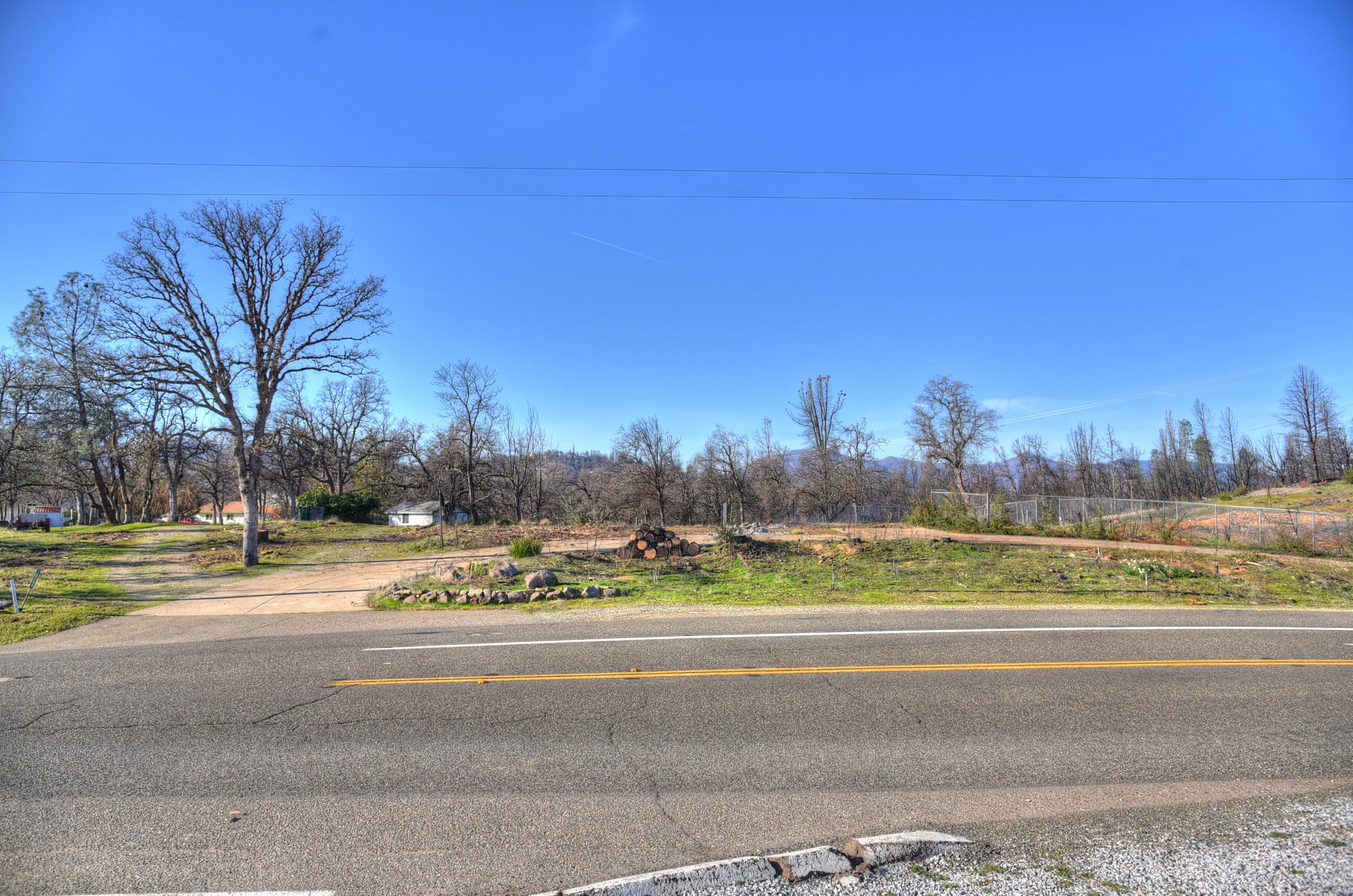 16244 Lower Springs Road Redding, CA 96001 - Photo 2 of 10 a view of a building and a yard