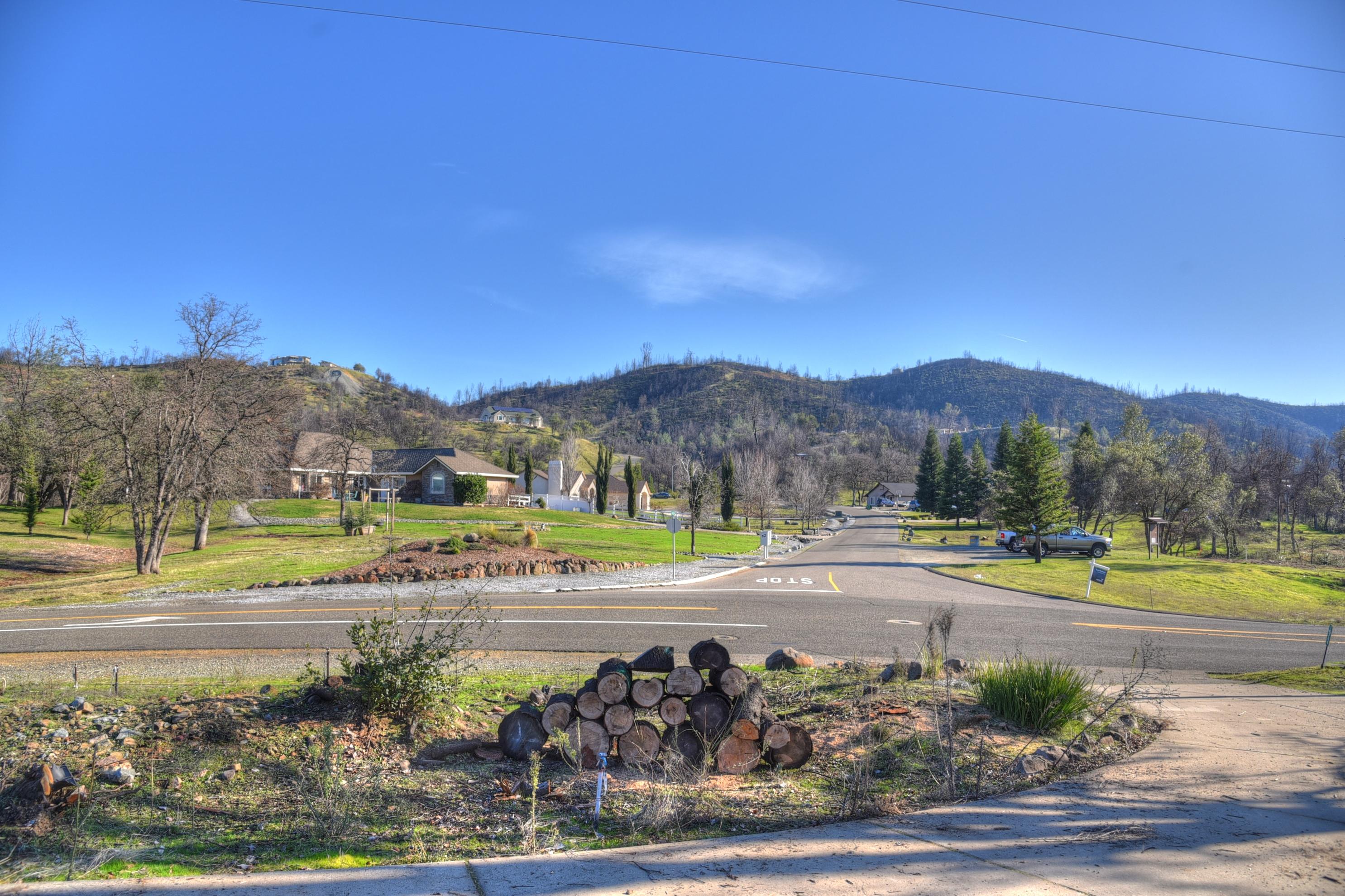 16244 Lower Springs Road Redding, CA 96001 - Photo 3 of 10 a view of a town with mountains in the background