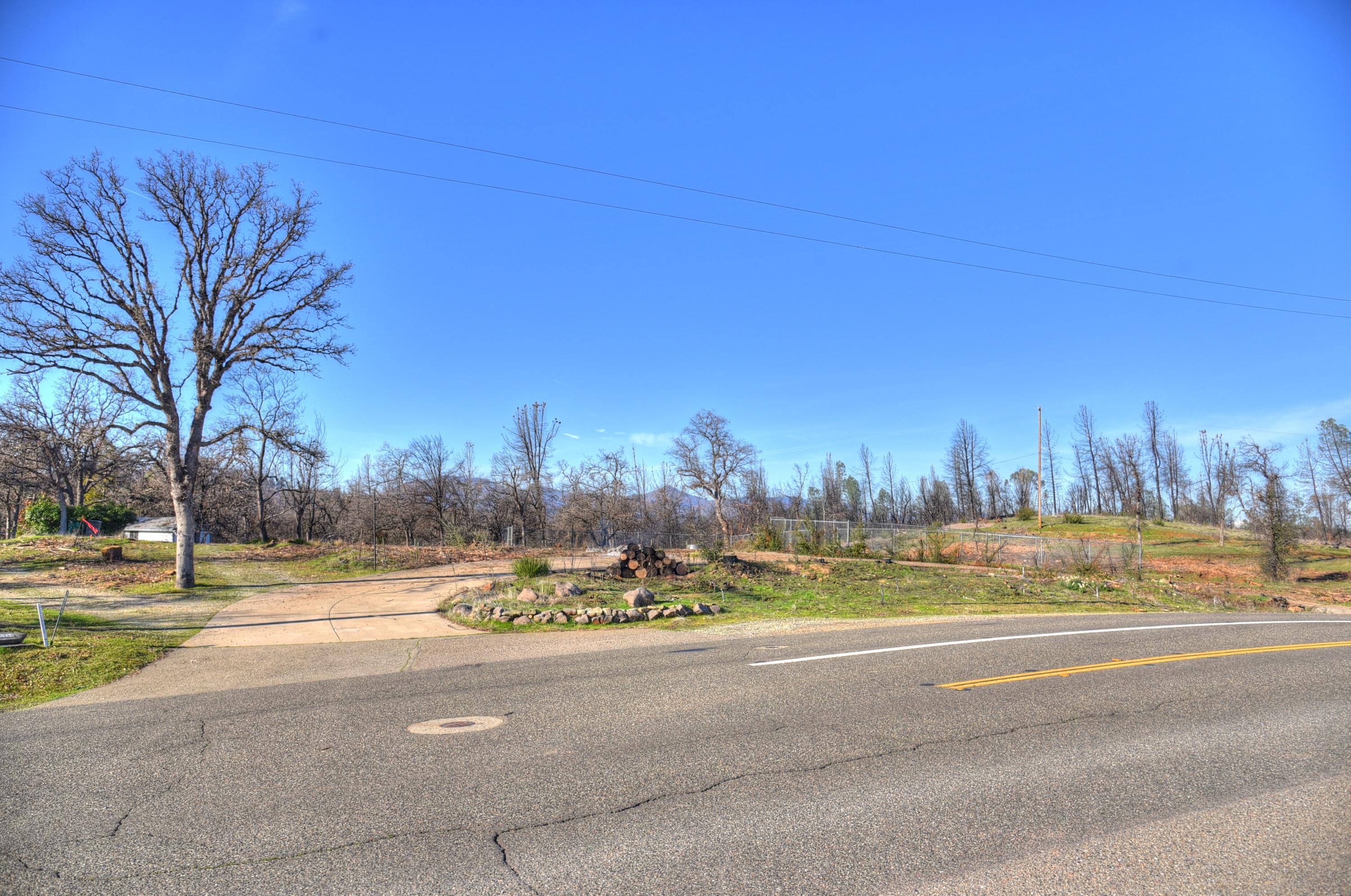 16244 Lower Springs Road Redding, CA 96001 - Photo 10 of 10 a view of a town with large trees