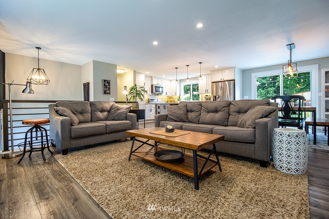 20118 103rd Place Northeast Bothell, WA 98011 - Photo 11 of 40 a living room with furniture and a large window