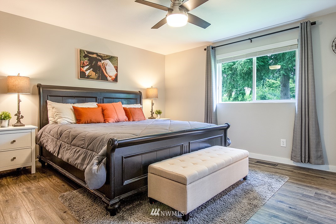 20118 103rd Place Northeast Bothell, WA 98011 - Photo 18 of 40 a bedroom with a bed and window