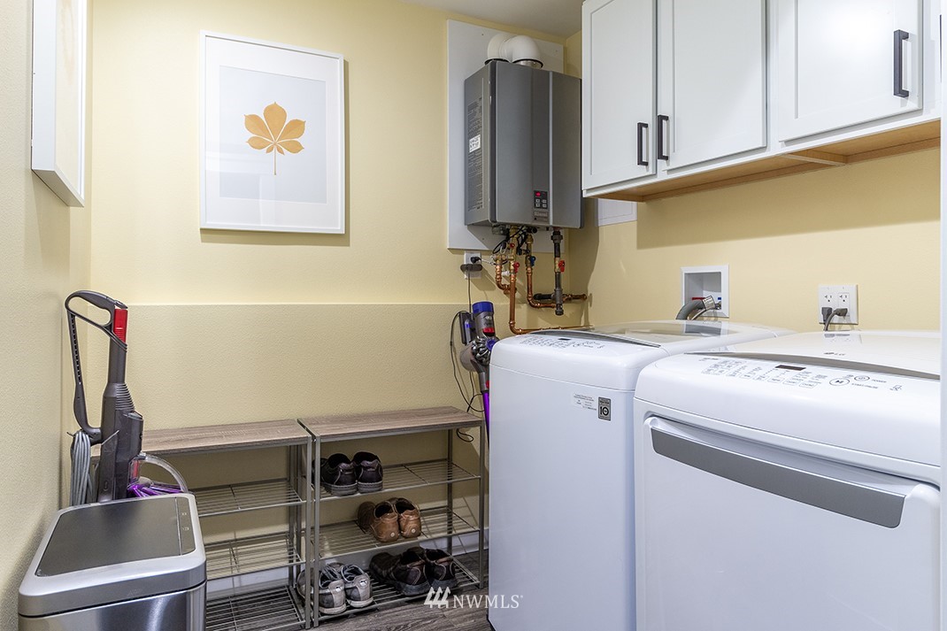 20118 103rd Place Northeast Bothell, WA 98011 - Photo 29 of 40 a room with storage and utility
