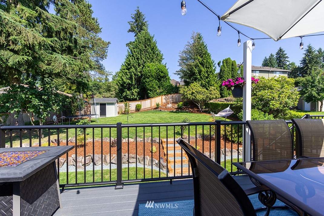 20118 103rd Place Northeast Bothell, WA 98011 - Photo 30 of 40 a view of a balcony with wooden floor and outdoor seating