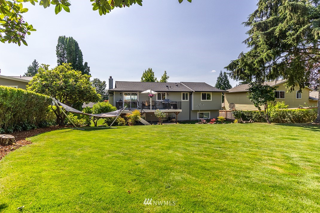 20118 103rd Place Northeast Bothell, WA 98011 - Photo 37 of 40 a view of a house with a big yard