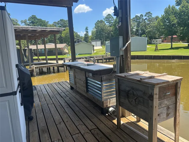 a view of a balcony with a table and chairs