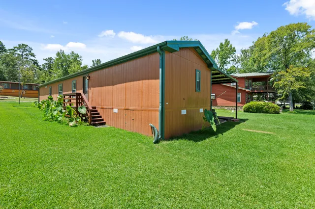 a view of a back yard of the house
