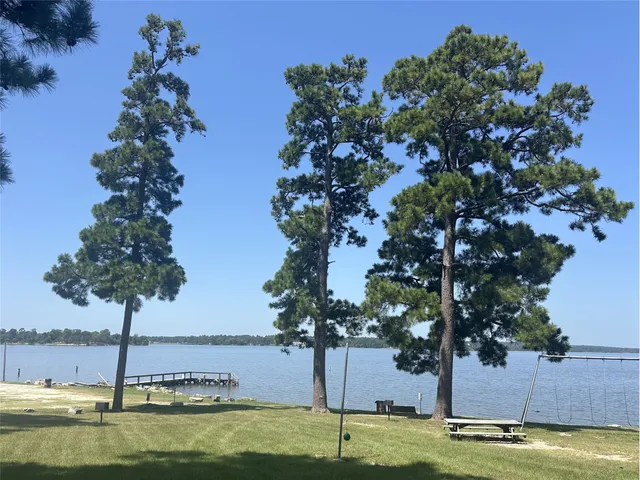 a view of a large body of water with water fall