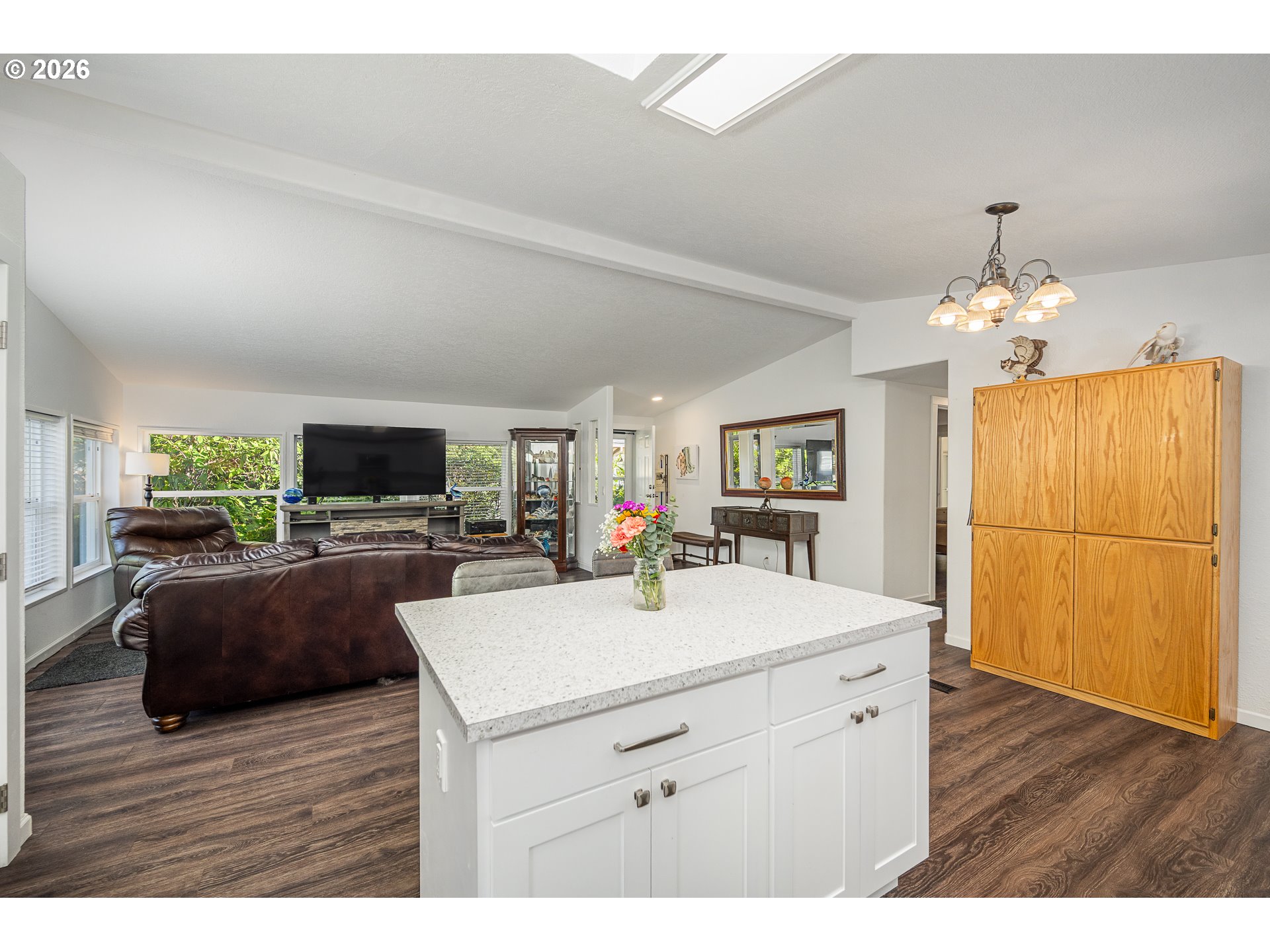 128 Evergreen Lane Florence, OR 97439 - Photo 15 of 34 a room with a wooden floor and furniture