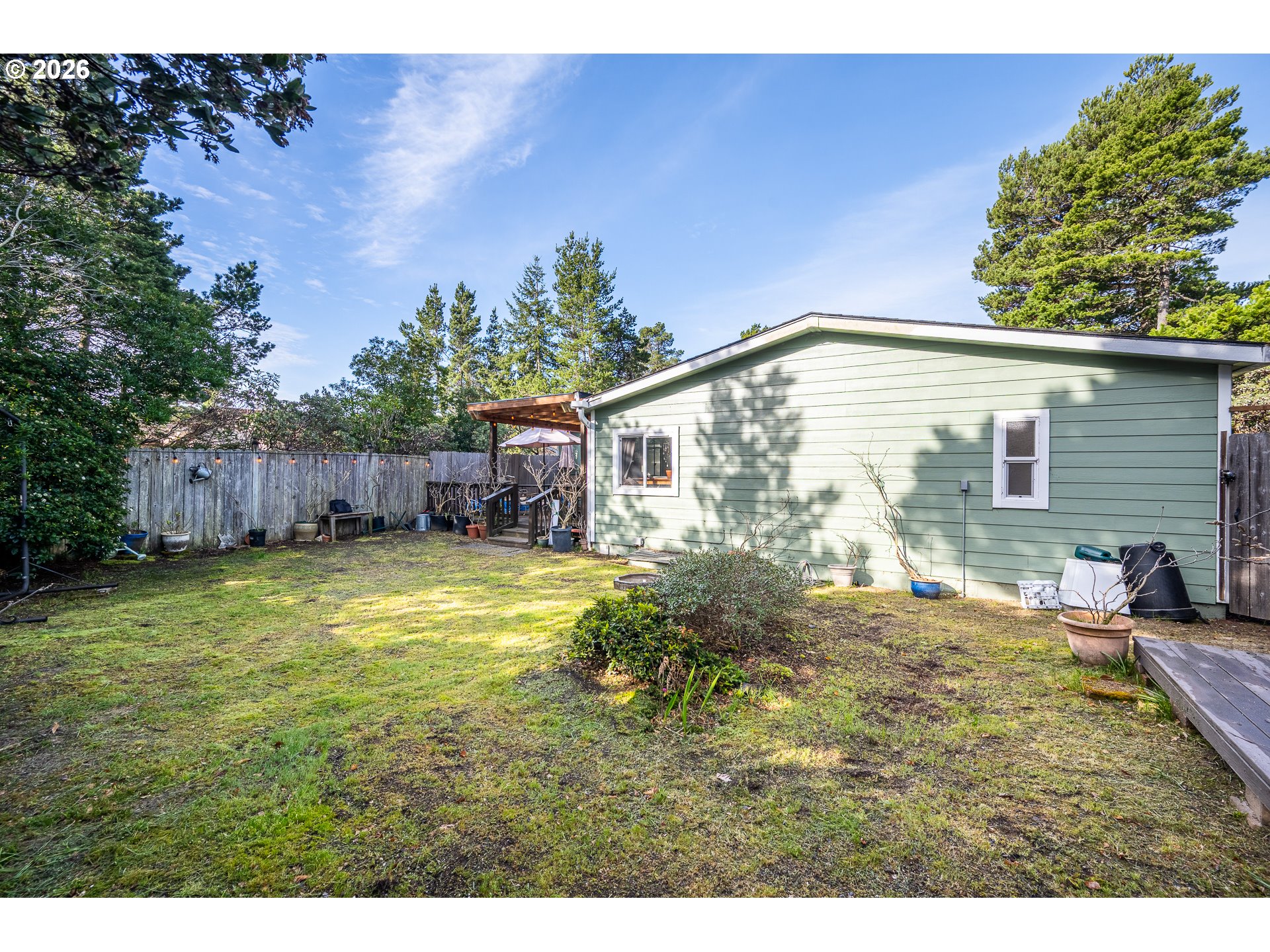 128 Evergreen Lane Florence, OR 97439 - Photo 29 of 34 a backyard of a house