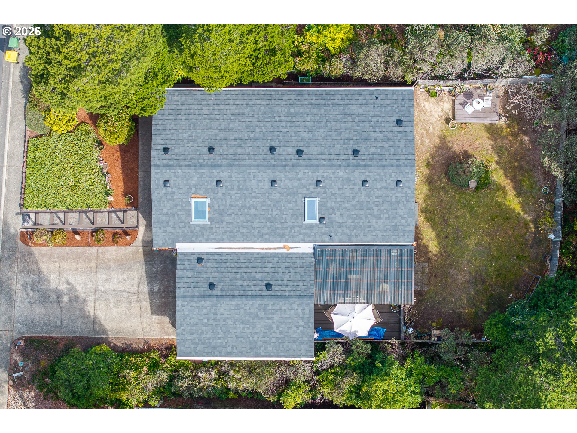 128 Evergreen Lane Florence, OR 97439 - Photo 3 of 34 an aerial view of a house with a yard