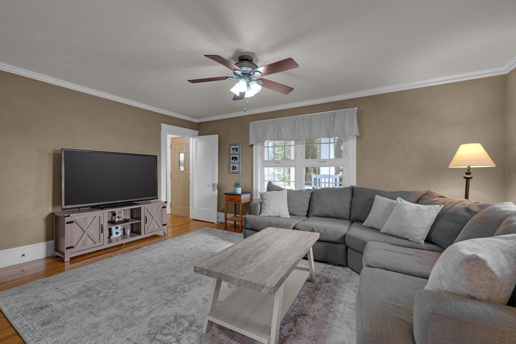 113 Bay State Road Worcester, MA 01606 - Photo 15 of 34 a living room with furniture and a flat screen tv