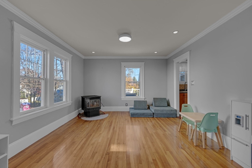 113 Bay State Road Worcester, MA 01606 - Photo 16 of 34 a living room with furniture and windows