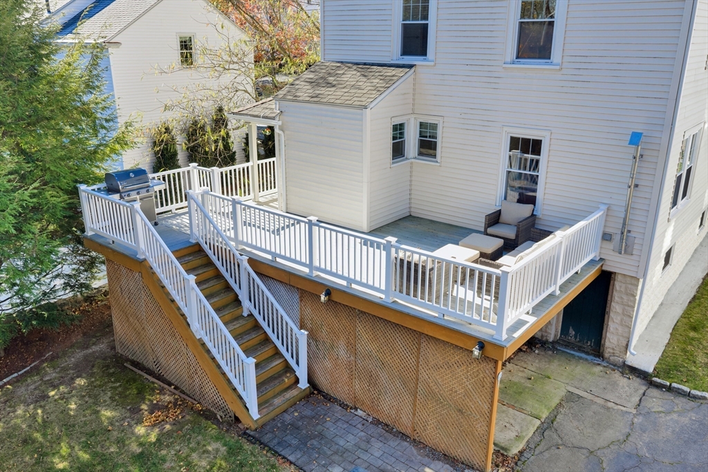 113 Bay State Road Worcester, MA 01606 - Photo 4 of 34 a balcony with wooden floor and furniture