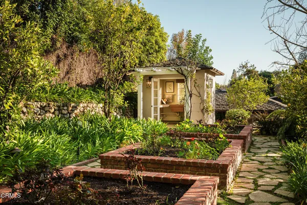 a front view of a house with yard