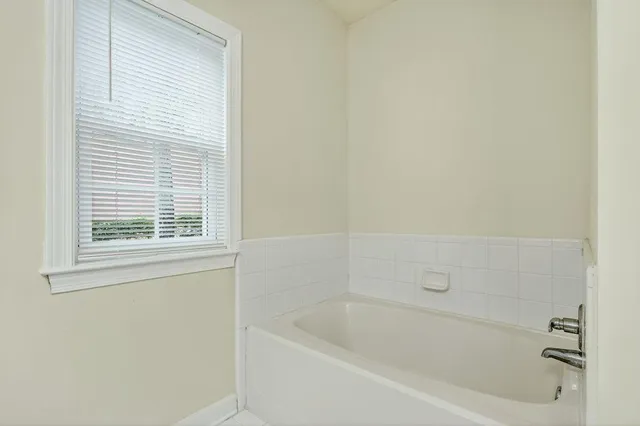 a bathroom with a bathtub