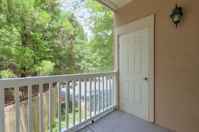 a view of empty room with windows