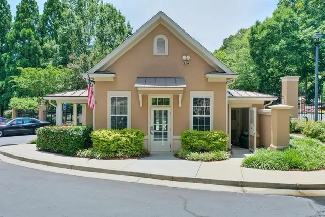 an aerial view of a house with mountain view
