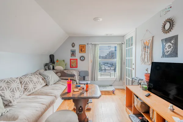a bedroom with a bed and cabinets