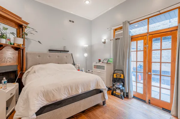 a bed room with a bed and a window