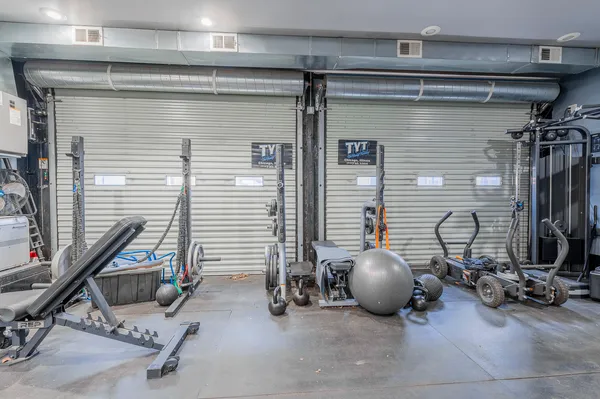 a view of a room with gym equipment