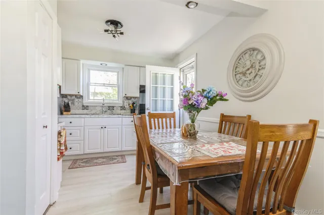 a view of a dining room with furniture