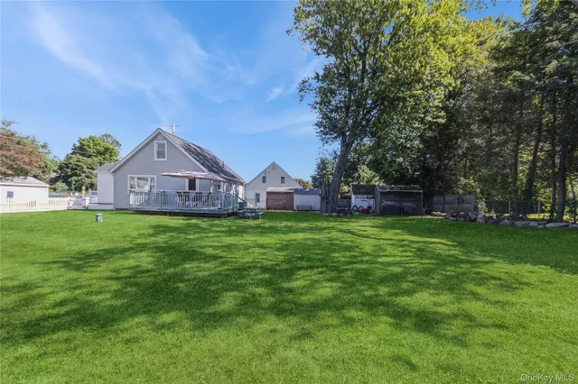 a view of a house with a big yard