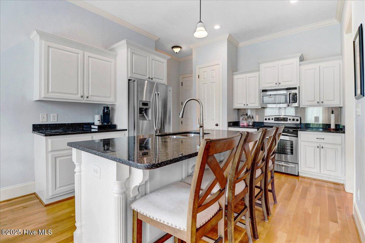 6886 Williams Place Sims, NC 27880 - Photo 11 of 31 Island in kitchen with bar seating. Appliances convey.