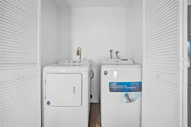 a utility room with dryer and washer