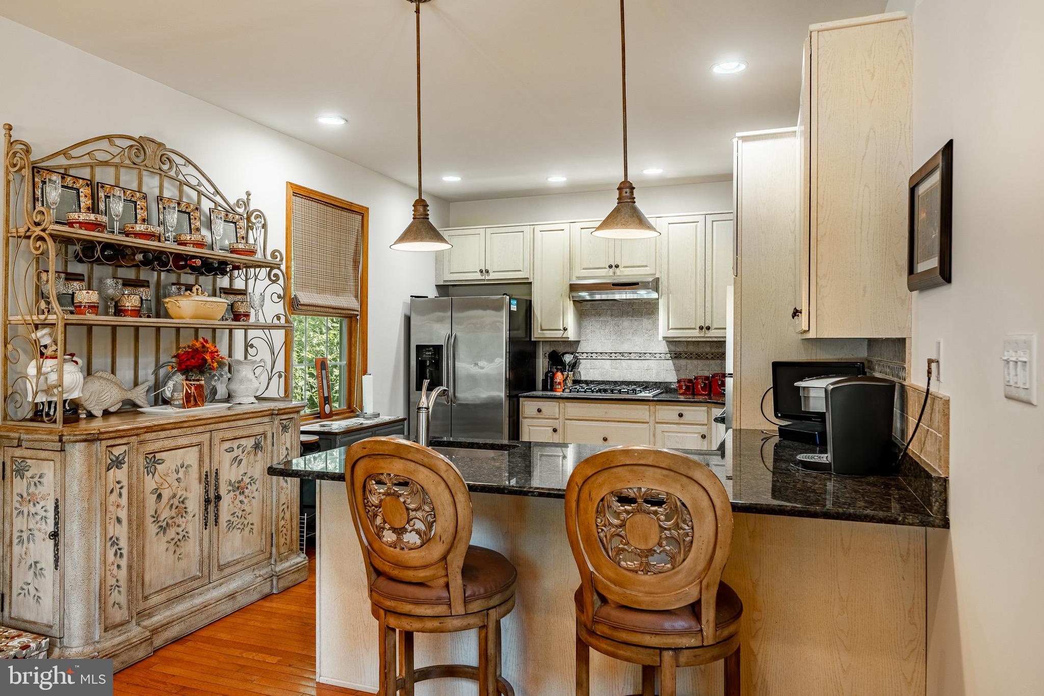 2 River Road Philadelphia, PA 19128 - Photo 15 of 46 a view of kitchen with stainless steel appliances granite countertop a stove a sink and a chandelier