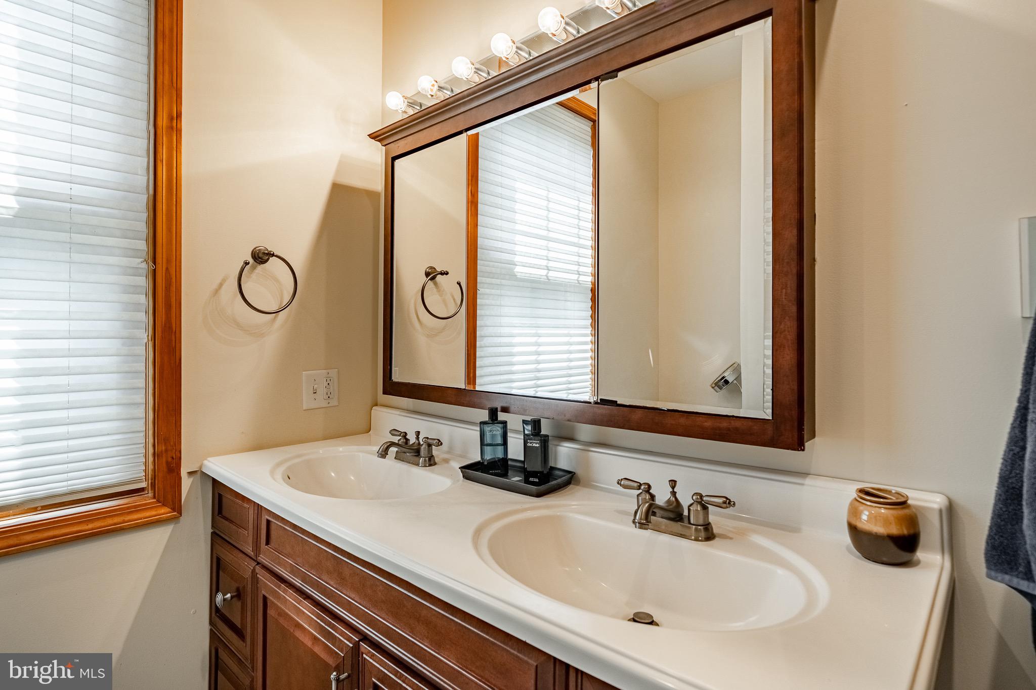 2 River Road Philadelphia, PA 19128 - Photo 22 of 46 a bathroom with a sink and a mirror