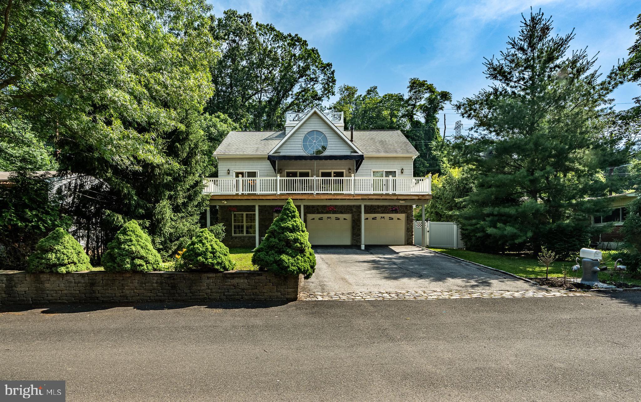 2 River Road Philadelphia, PA 19128 - Photo 3 of 46 front view of a house with a yard