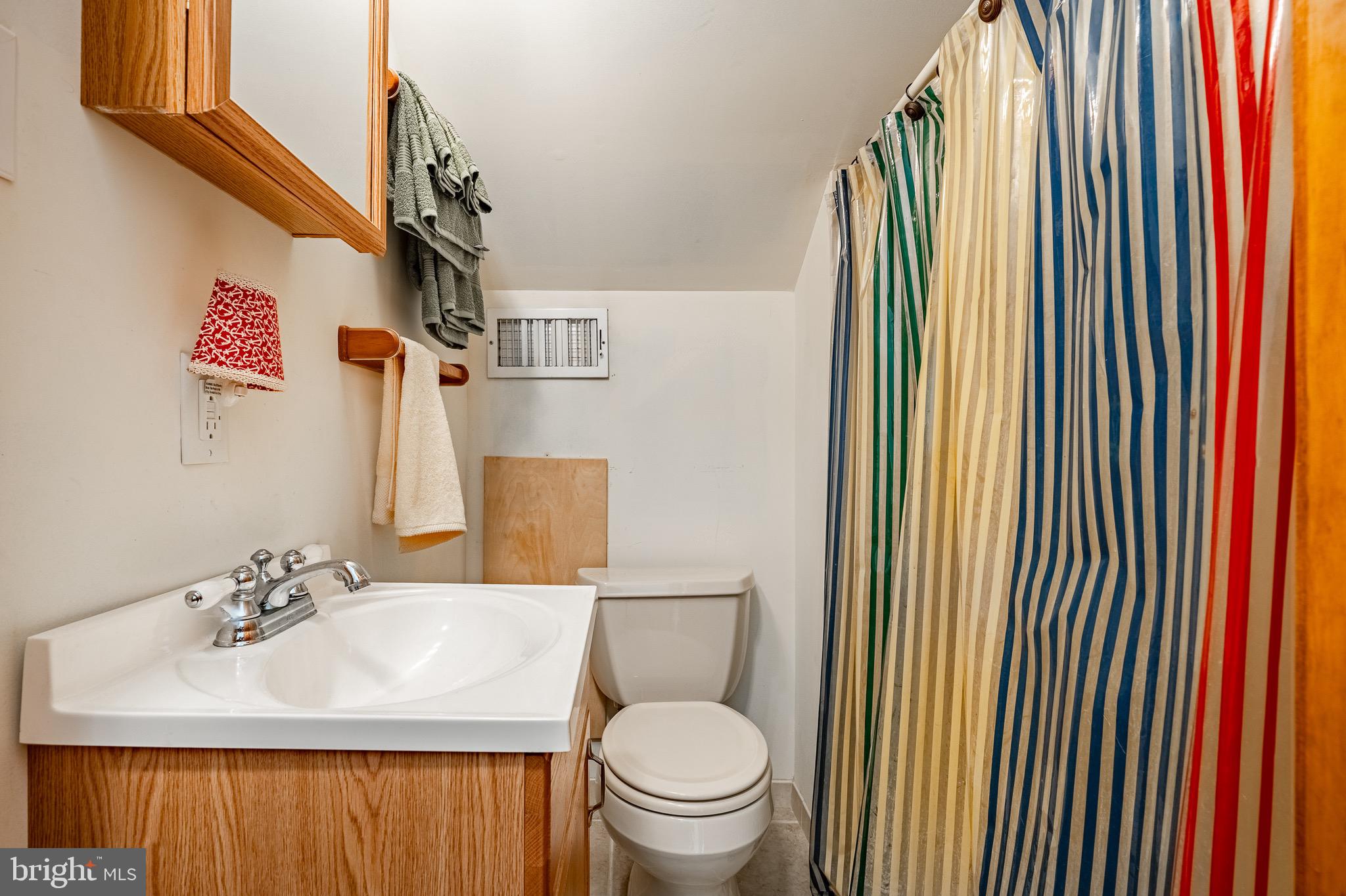 2 River Road Philadelphia, PA 19128 - Photo 32 of 46 a bathroom with a sink toilet and mirror