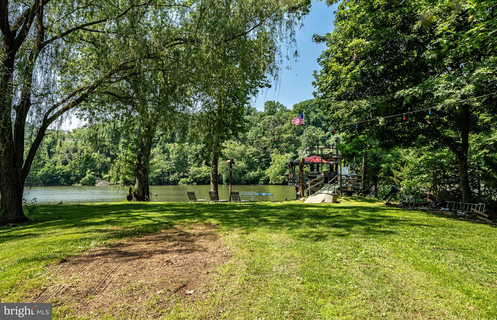 2 River Road Philadelphia, PA 19128 - Photo 38 of 46 a garden view with a fountain