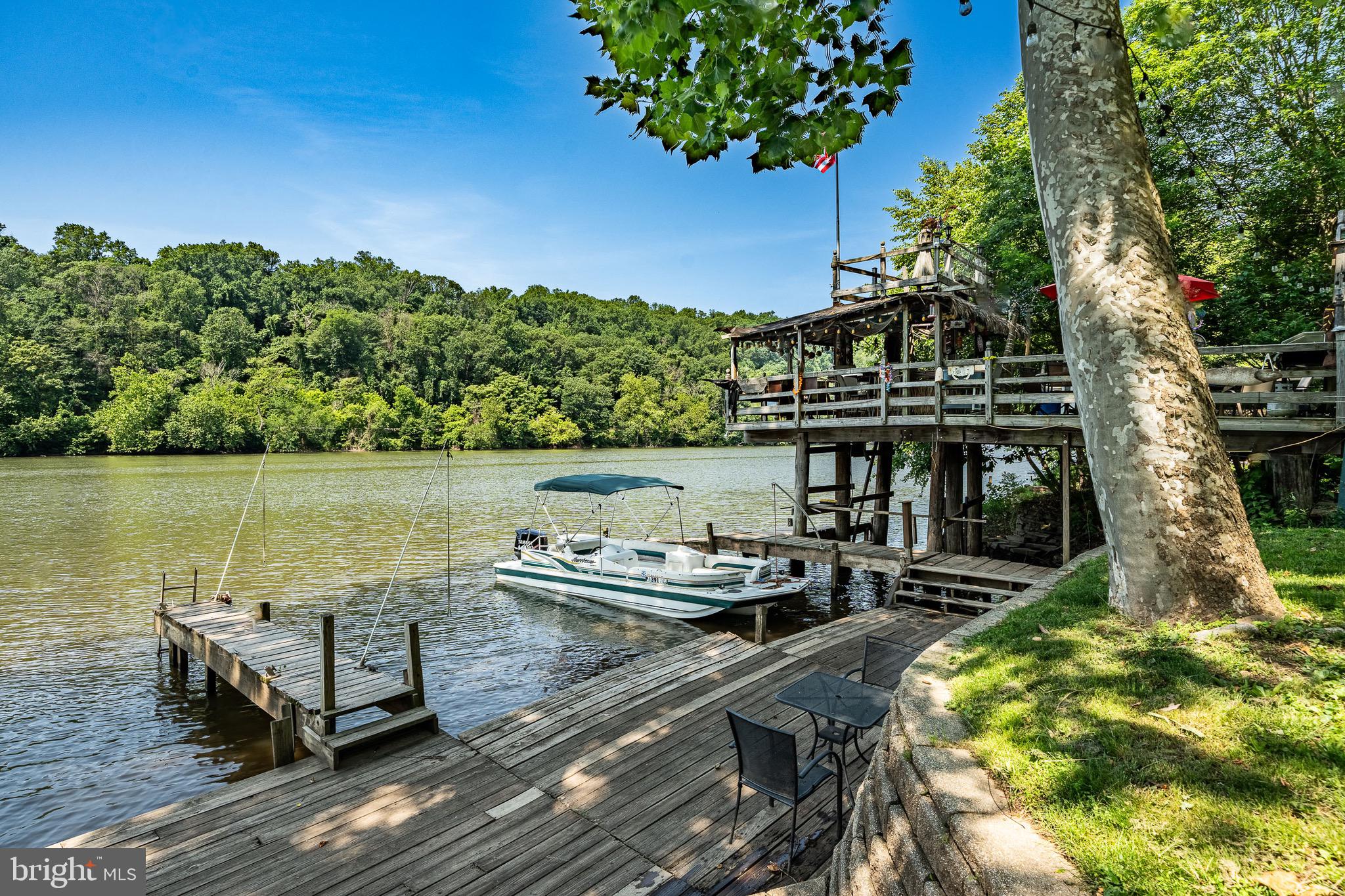 2 River Road Philadelphia, PA 19128 - Photo 41 of 46 a view of a balcony with two chairs and a table