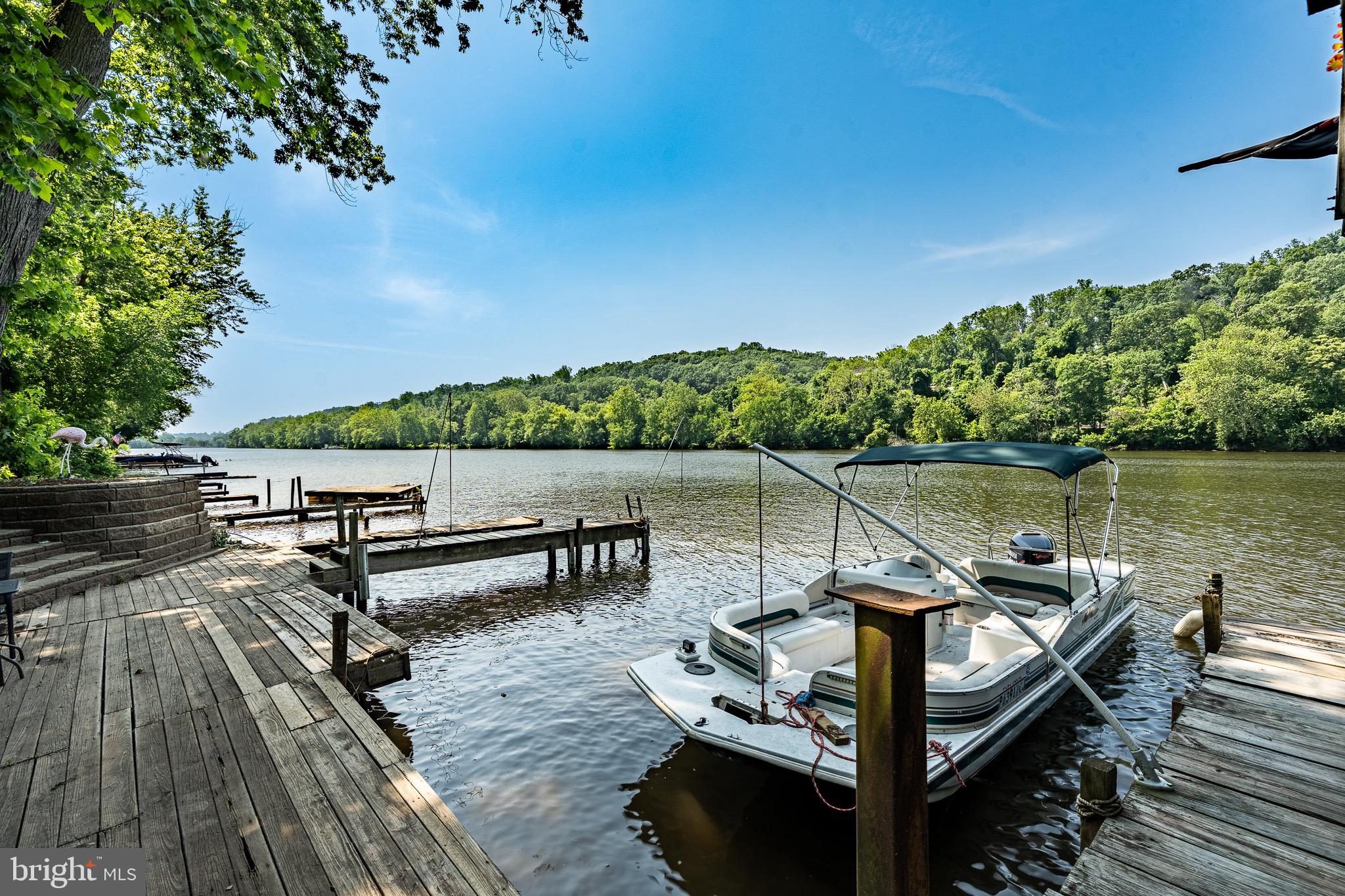 2 River Road Philadelphia, PA 19128 - Photo 43 of 46 a view of a lake with outdoor seating